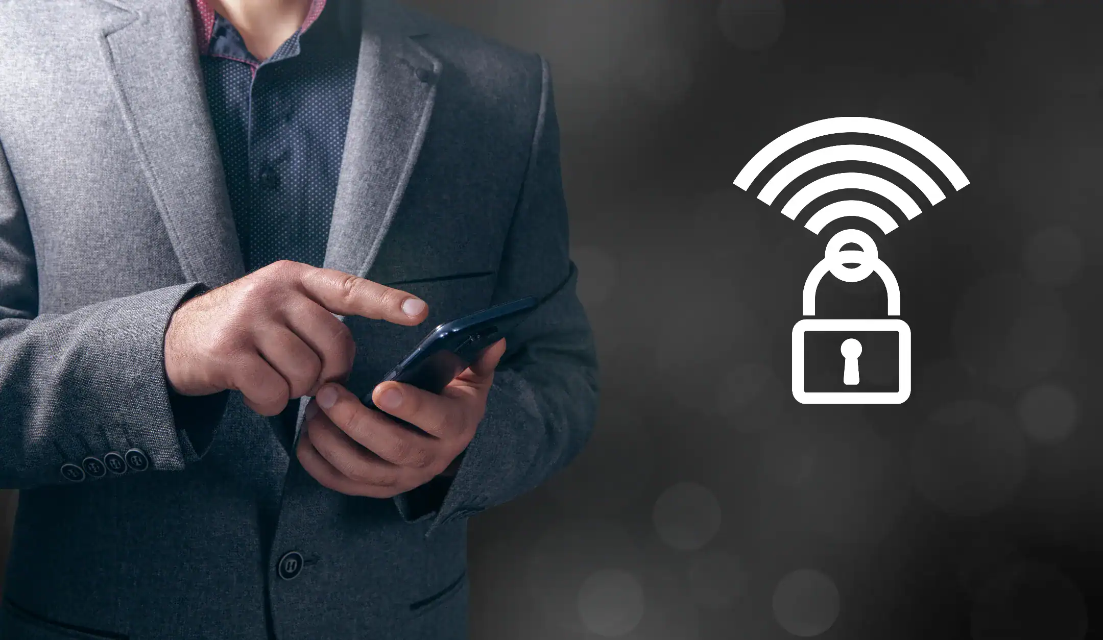 Businessman using smartphone with security icon overlay.